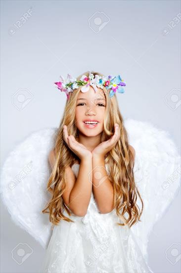DZIECI ANIOŁY - 10493878-Angel-children-girl-open-hands-gesture-with-wings-Stock-Photo-angel.jpg